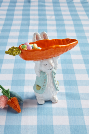 bunny holding carrot candy dish