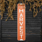 happy harvest sign orange